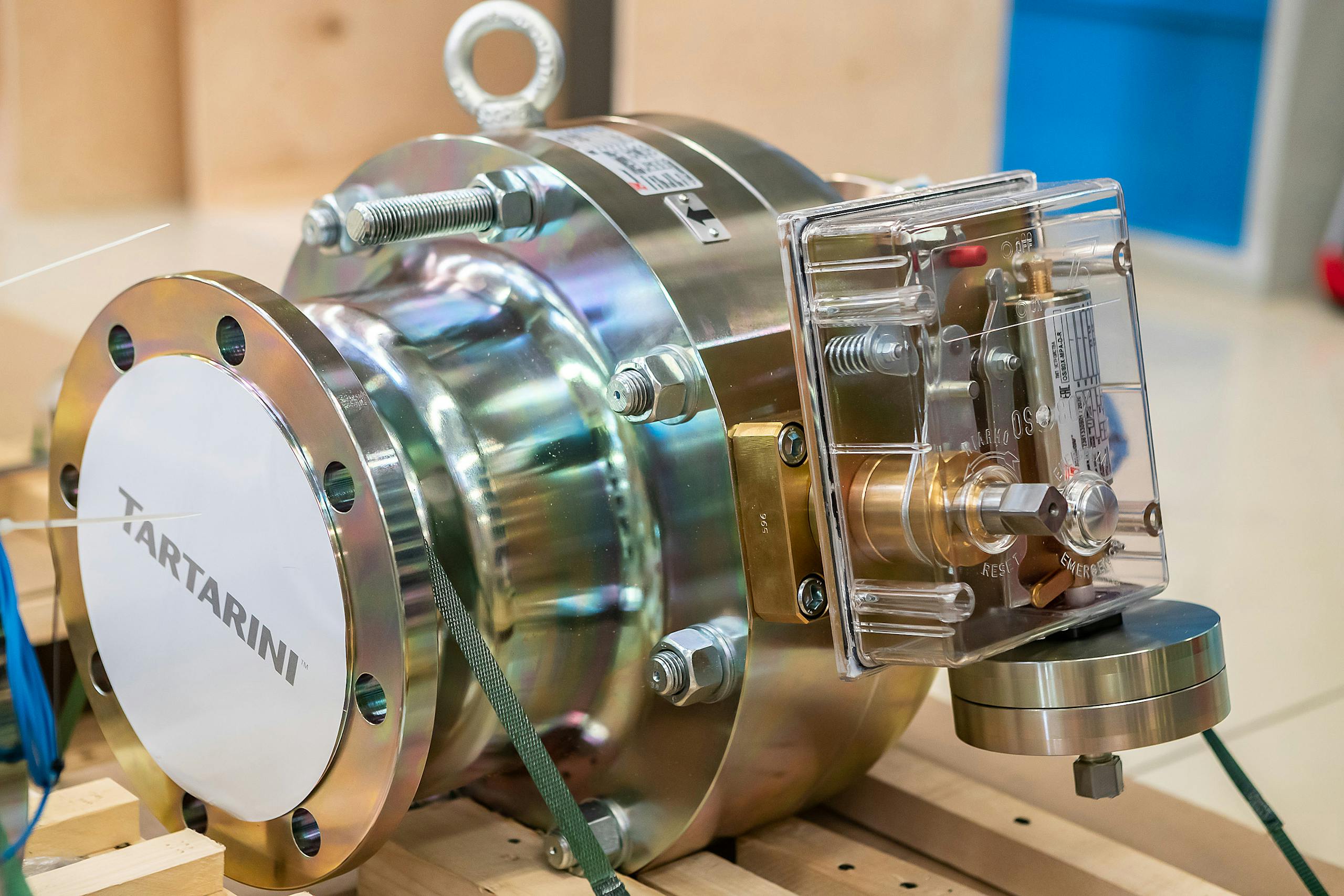 Detailed view of industrial valve machinery inside a workshop setting.